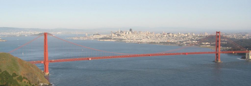image of Golden Gate bridge and the view of San Francisco behind it